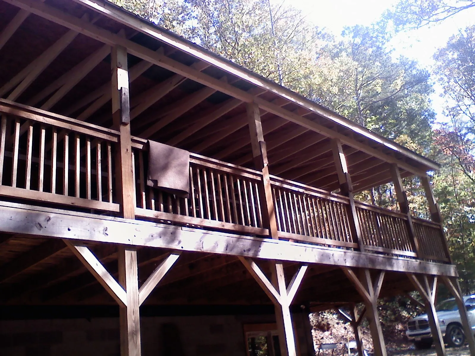 Timber framing under a new elevated porch and deck — Roof Leak Repair in Owasso by Roofing Brothers
